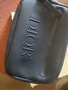 Dior Men’s Black Embossed Logo Travel Pouch